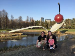 Antonia Grant and her family poses at the Minneapolis Spoon & Cherry sculpture