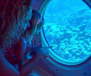 Mom and daughter in a submarine